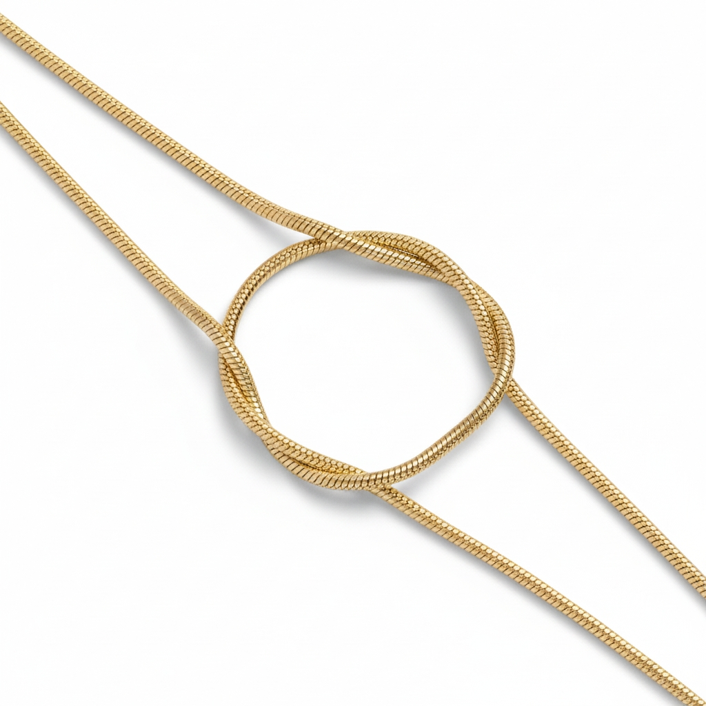 Aura Knot Bracelet — Gold delicate bracelet champagne gold-tone with knot detail on clean white background, product flat lay, ZARIÉ fine jewellery SÉRÉNITÉ collection