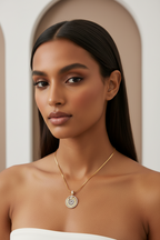 Aurelia Spiral Pendant — Gold pendant necklace champagne gold-tone on clean white background, product flat lay, ZARIÉ fine jewellery LUMIÈRE collection