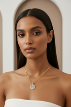 Aurelia Spiral Pendant — Gold pendant necklace champagne gold-tone additional product view on soft beige background, ZARIÉ fine jewellery LUMIÈRE collection