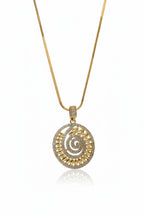 Aurelia Spiral Pendant — Gold pendant necklace champagne gold-tone additional product view on soft beige background, ZARIÉ fine jewellery LUMIÈRE collection