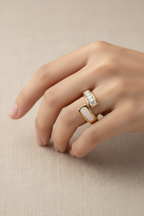 Aurélia Band fine jewellery piece lifestyle shot worn on model against neutral background, ZARIÉ fine jewellery SÉRÉNITÉ collection