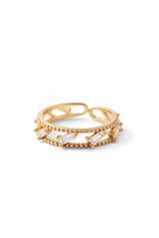 Bezel Glow Ring open band ring on clean white background, product flat lay, ZARIÉ fine jewellery LUMIÈRE collection