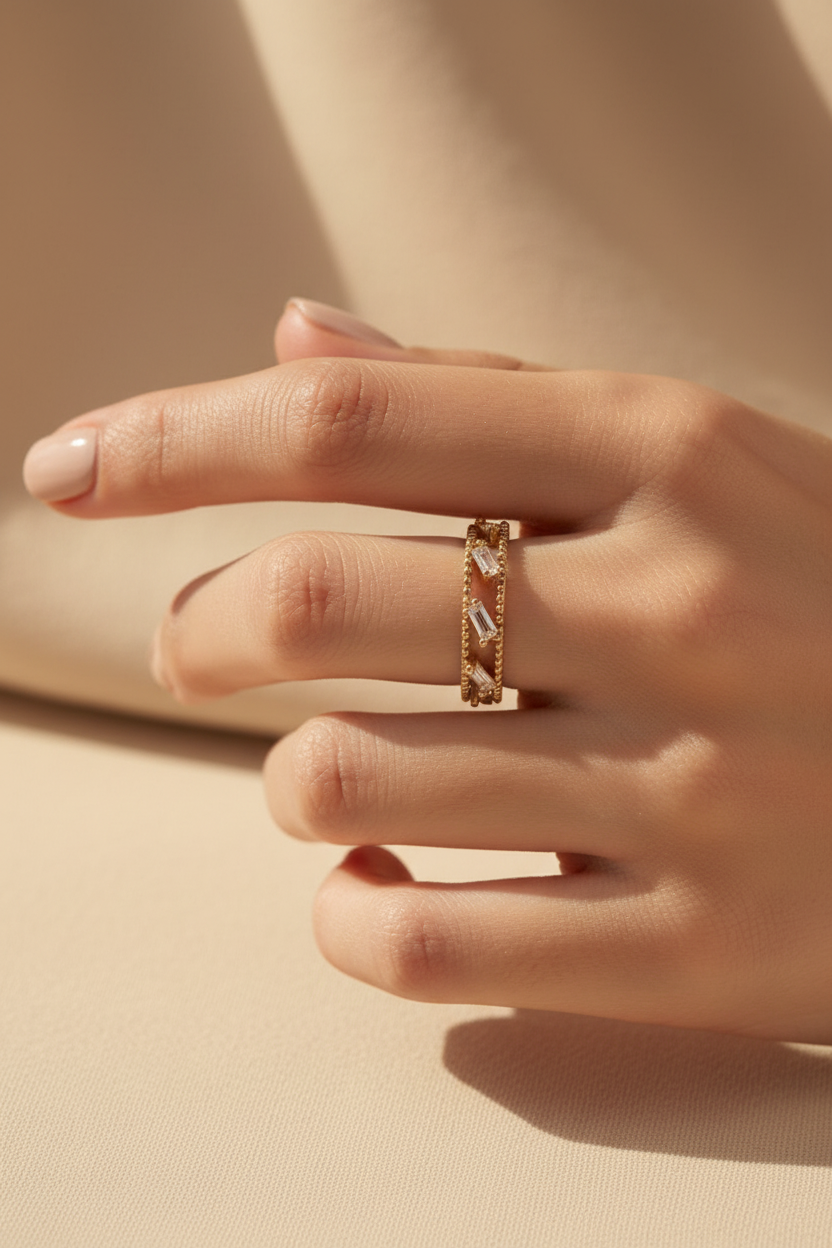 Bezel Glow Ring open band ring lifestyle shot worn on model against neutral background, ZARIÉ fine jewellery LUMIÈRE collection