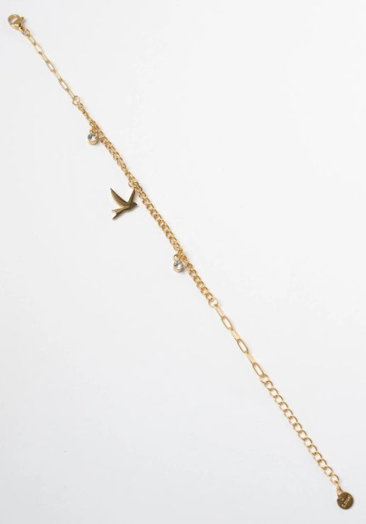 Bird Charm Bracelet – Gold delicate bracelet champagne gold-tone on clean white background, product flat lay, ZARIÉ fine jewellery SÉRÉNITÉ collection