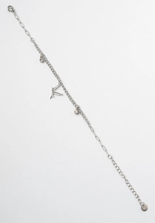 Bird Charm Bracelet- Silver delicate bracelet silver-tone on clean white background, product flat lay, ZARIÉ fine jewellery ÉLORA collection