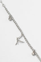 Bird Charm Bracelet- Silver delicate bracelet silver-tone on clean white background, product flat lay, ZARIÉ fine jewellery ÉLORA collection