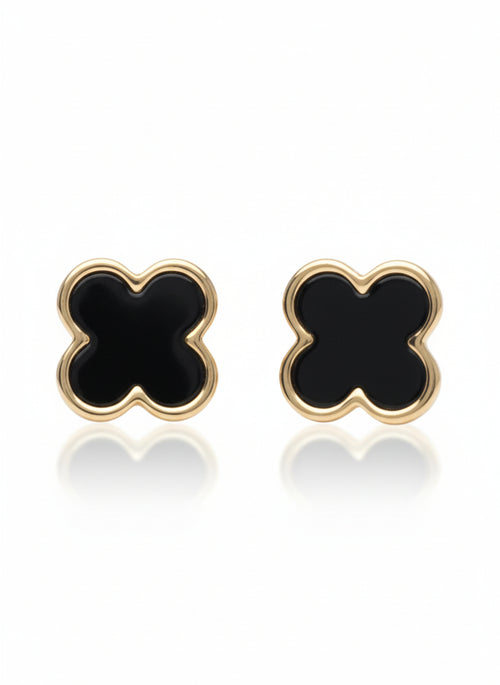 Pair of black clover-shaped earrings with gold outlines on a white background