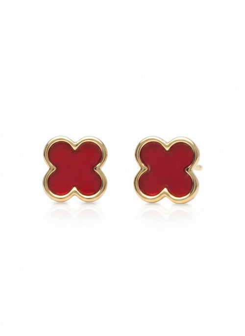 Red flower-shaped earrings with gold outlines on a white background