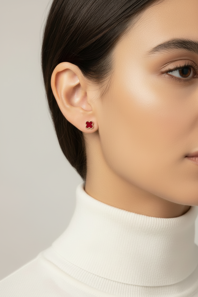 Clover Stud Earrings – Red stud earrings four-leaf clover motif lifestyle shot worn on model against neutral background, ZARIÉ fine jewellery RAYONNE collection