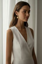 Coin Halo Drop Earrings drop earrings lifestyle shot worn on model against neutral background, ZARIÉ fine jewellery HARMONIE collection