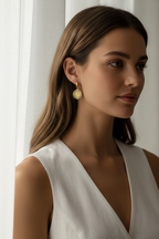 Coin Halo Drop Earrings drop earrings lifestyle shot worn on model against neutral background, ZARIÉ fine jewellery HARMONIE collection