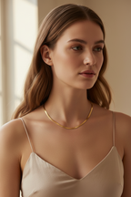Contour Chain Necklace — Shortline fine chain necklace lifestyle shot worn on model against neutral background, ZARIÉ fine jewellery HARMONIE collection