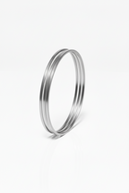 Contour Trio Bangles — Silver fine jewellery piece silver-tone on clean white background, product flat lay, ZARIÉ fine jewellery ÉLORA collection