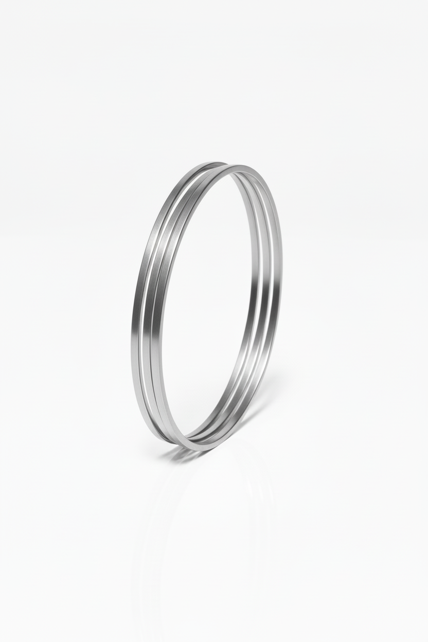 Contour Trio Bangles — Silver fine jewellery piece silver-tone on clean white background, product flat lay, ZARIÉ fine jewellery ÉLORA collection
