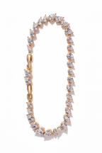 Crossed Teardrop Line Bracelet drop earrings on clean white background, product flat lay, ZARIÉ fine jewellery LUMIÈRE collection