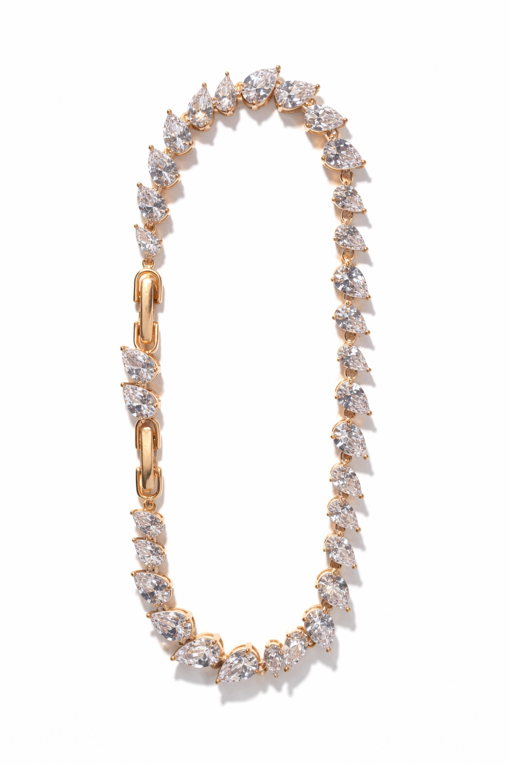 Crossed Teardrop Line Bracelet drop earrings on clean white background, product flat lay, ZARIÉ fine jewellery LUMIÈRE collection