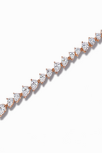 Crossed Teardrop Line Bracelet drop earrings on clean white background, product flat lay, ZARIÉ fine jewellery LUMIÈRE collection