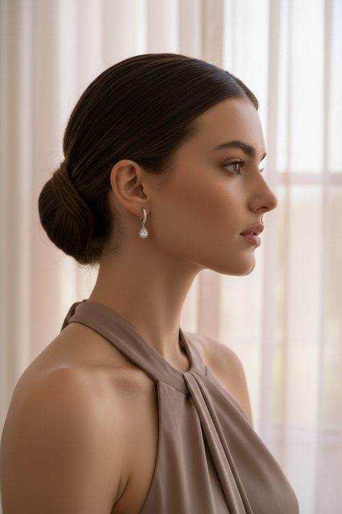 Crystal Drop Earrings – Statement drop earrings lifestyle shot worn on model against neutral background, ZARIÉ fine jewellery ÉLORA collection