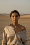 Crystal Snow Necklace — Gold fine chain necklace champagne gold-tone lifestyle shot worn on model against neutral background, ZARIÉ fine jewellery LUMIÈRE collection