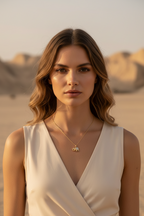 Elephant Crest Necklace — Gold fine chain necklace champagne gold-tone lifestyle shot worn on model against neutral background, ZARIÉ fine jewellery LUMIÈRE collection