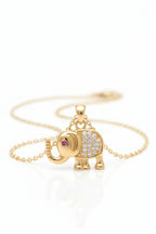 Elephant Crest Necklace — Gold fine chain necklace champagne gold-tone on clean white background, product flat lay, ZARIÉ fine jewellery LUMIÈRE collection