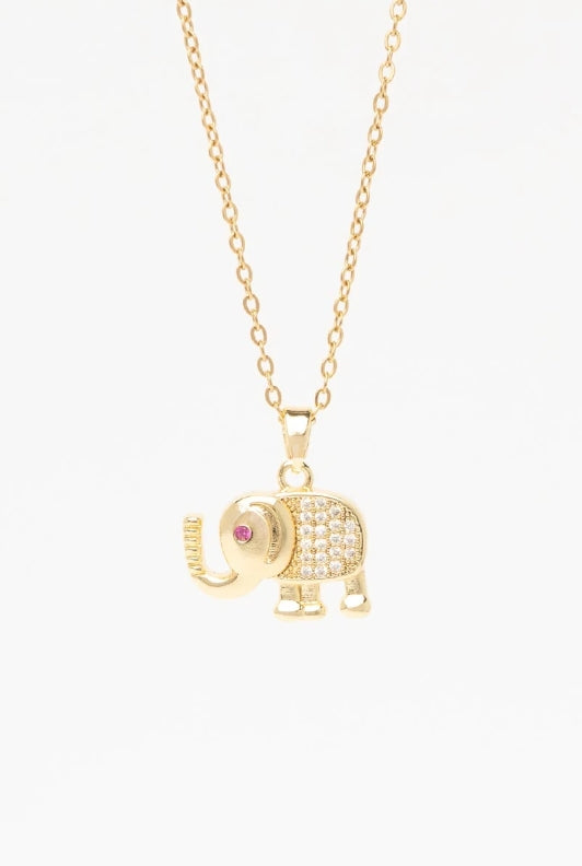Elephant Crest Necklace — Gold fine chain necklace champagne gold-tone lifestyle shot worn on model against neutral background, ZARIÉ fine jewellery LUMIÈRE collection