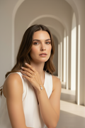 Eye Motif Handpiece fine jewellery piece lifestyle shot worn on model against neutral background, ZARIÉ fine jewellery RAYONNE collection