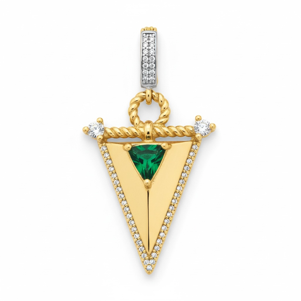Gold pendant with a green gemstone on a white background
