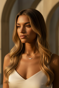 Feather Line Necklace fine chain necklace lifestyle shot worn on model against neutral background, ZARIÉ fine jewellery ÉLORA collection