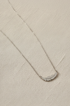 Feather Line Necklace fine chain necklace on clean white background, product flat lay, ZARIÉ fine jewellery ÉLORA collection