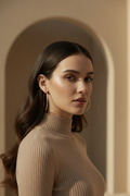 Full Pavé Hoop Earrings — Gold hoop earrings champagne gold-tone with pavé stone setting lifestyle shot worn on model against neutral background, ZARIÉ fine jewellery LUMIÈRE collection