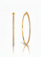 Full Pavé Hoop Earrings — Gold hoop earrings champagne gold-tone with pavé stone setting on clean white background, product flat lay, ZARIÉ fine jewellery LUMIÈRE collection
