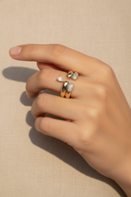 Halo Crest Ring open band ring lifestyle shot worn on model against neutral background, ZARIÉ fine jewellery LUMIÈRE collection