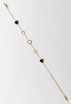 Heart Motif Chain Bracelet fine chain necklace lifestyle shot worn on model against neutral background, ZARIÉ fine jewellery SÉRÉNITÉ collection