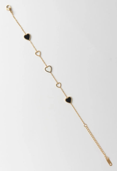 Heart Motif Chain Bracelet fine chain necklace lifestyle shot worn on model against neutral background, ZARIÉ fine jewellery SÉRÉNITÉ collection