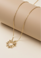 Inner Heart Necklace — Gold fine chain necklace champagne gold-tone lifestyle shot against neutral background, ZARIÉ fine jewellery AMOURÉ collection