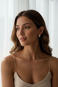 Layered Pavé Mini Earrings open band ring with pavé stone setting lifestyle shot worn on model against neutral background, ZARIÉ fine jewellery LUMIÈRE collection