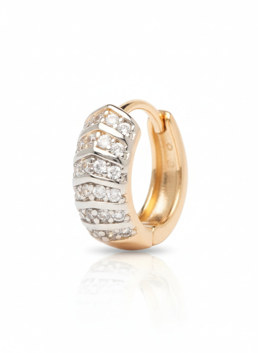 Gold hoop earring with diamond accents on a white background