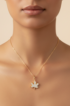 Leaf Crest Necklace fine chain necklace lifestyle shot worn on model against neutral background, ZARIÉ fine jewellery LUMIÈRE collection