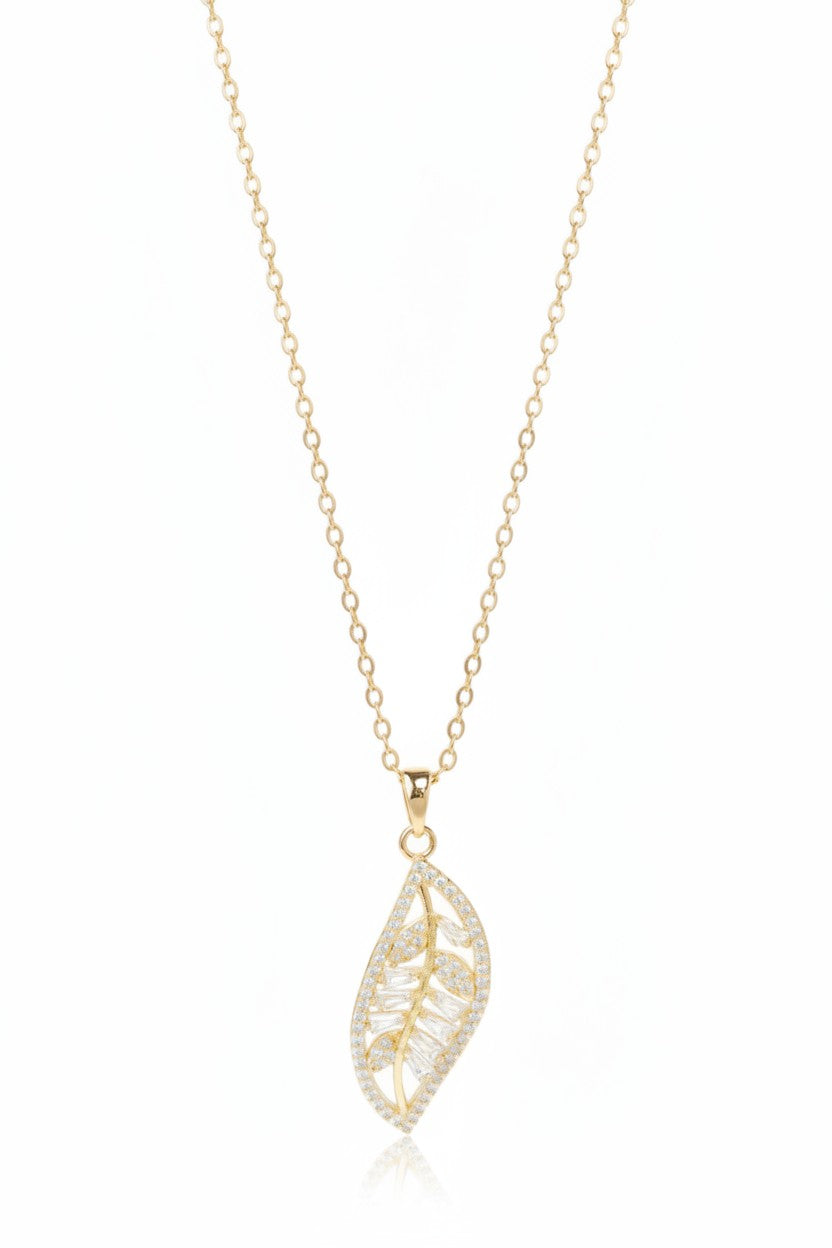 Leaf Silhouette Necklace — Gold fine chain necklace champagne gold-tone lifestyle shot worn on model against neutral background, ZARIÉ fine jewellery LUMIÈRE collection