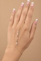 Linear Stone Handpiece fine jewellery piece on clean white background, product flat lay, ZARIÉ fine jewellery RAYONNE collection