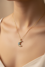 Lunar Crest Necklace — Gold fine chain necklace champagne gold-tone lifestyle shot worn on model against neutral background, ZARIÉ fine jewellery LUMIÈRE collection