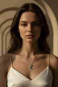 Lunar Crest Necklace — Silver fine chain necklace silver-tone lifestyle shot worn on model against neutral background, ZARIÉ fine jewellery ÉLORA collection