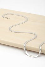 Lustre Bold Necklace — Silver fine chain necklace silver-tone on clean white background, product flat lay, ZARIÉ fine jewellery ÉLORA collection