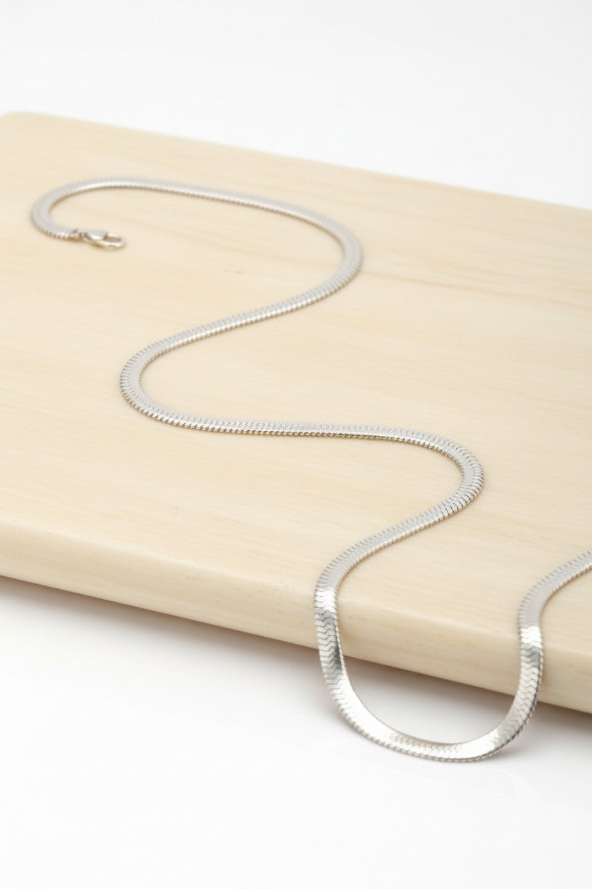 Lustre Bold Necklace — Silver fine chain necklace silver-tone on clean white background, product flat lay, ZARIÉ fine jewellery ÉLORA collection