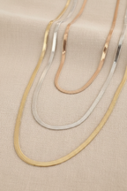 Lustre Grand Necklace fine chain necklace on clean white background, product flat lay, ZARIÉ fine jewellery HARMONIE collection