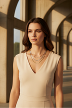 Lustre Grand Necklace fine chain necklace lifestyle shot worn on model against neutral background, ZARIÉ fine jewellery HARMONIE collection