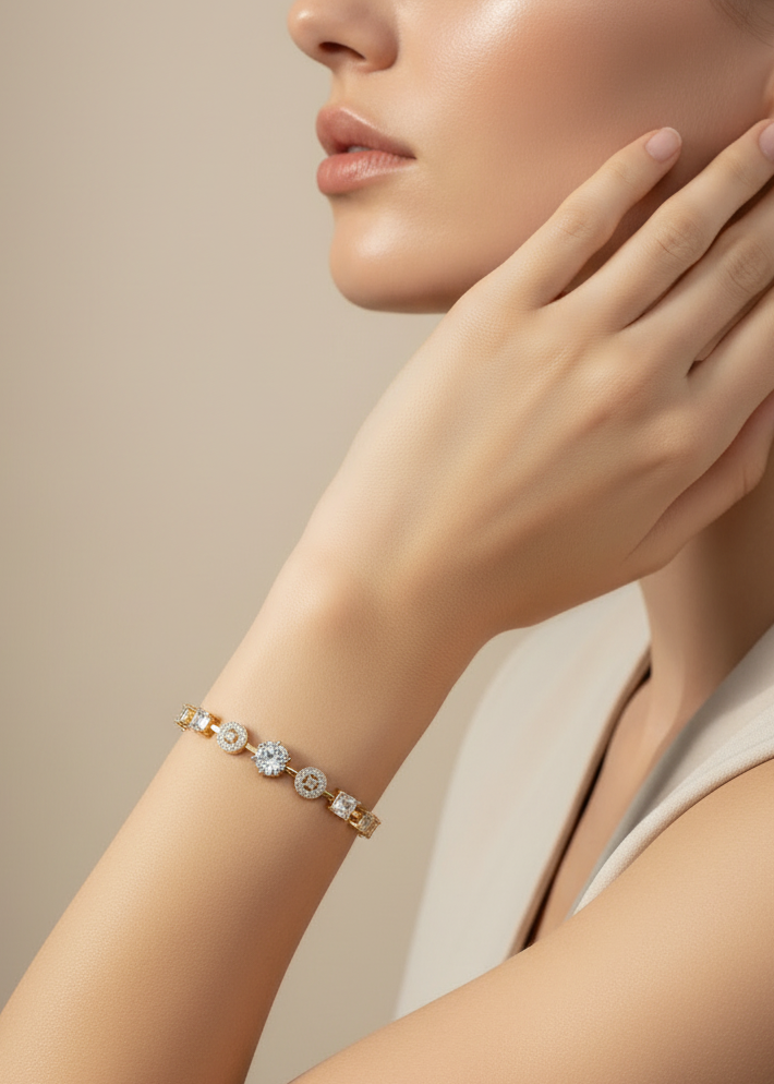 Lustre Link Bracelet — Gold delicate bracelet champagne gold-tone lifestyle shot worn on model against neutral background, ZARIÉ fine jewellery LUMIÈRE collection