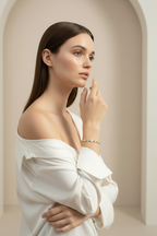 Lustre Link Bracelet — Gold delicate bracelet champagne gold-tone lifestyle shot worn on model against neutral background, ZARIÉ fine jewellery LUMIÈRE collection