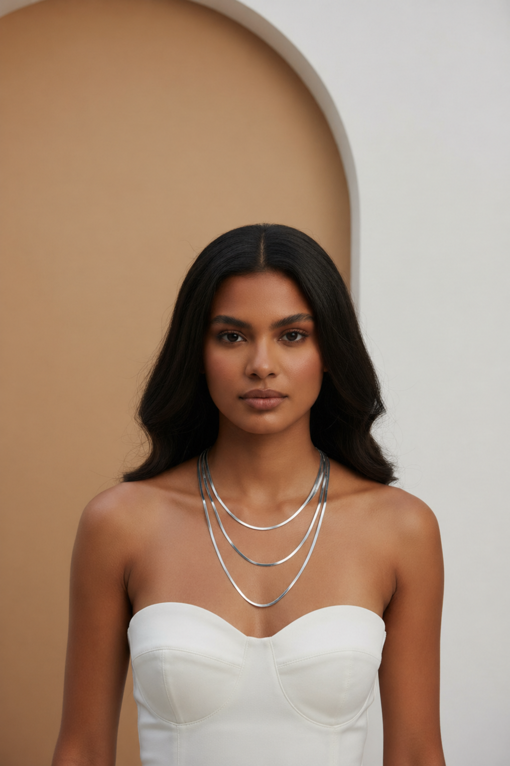 Lustre Trio Necklace fine chain necklace lifestyle shot worn on model against neutral background, ZARIÉ fine jewellery ÉLORA collection